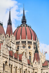 Fototapeta premium Hungarian Parliament Building in the evening at the Danube river in Budapest, Hungary