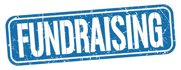 FUNDRAISING text written on blue stamp sign.