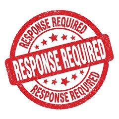 RESPONSE REQUIRED text written on red round stamp sign.