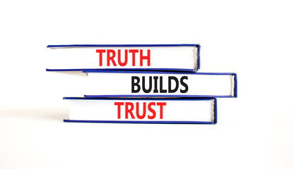 Truth builds trust symbol. Concept words Truth builds trust on books on a beautiful white table...