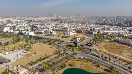 Obraz premium Aerial view of modern city skyline and buildings at sunrise in Puebla.