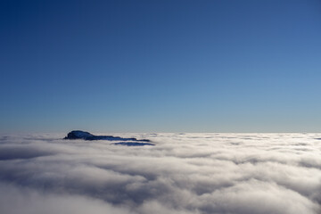 Fototapeta na wymiar sea of clouds in Ceahlau mountain, Romania