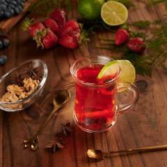 blueberry and strawberry tea with lemon.