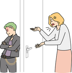 Angry mother talking to teen goth child