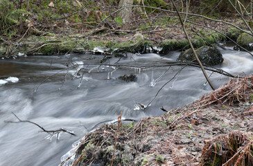 Cascade in the wilderness in Finland in winter
