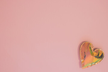 Valentine's day.One heart on pastel pink background.Flat lay with copy space.Minimal love, romance concept.