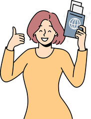 Smiling woman with passport in hands