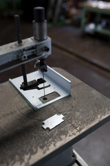 Work that cuts material with a saw
