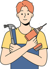 Smiling repairman with tools in hands