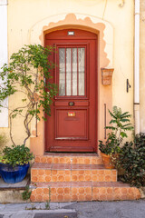 Red door on a home in Arles.