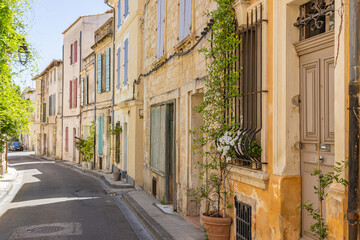 Potted plants along a street in Arles.