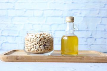 peanuts and oils in a container 