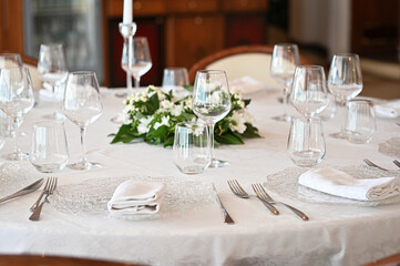 Table setting for a lovey dinner, table setting. Cafe or restaurant interior 