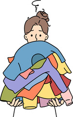 Unhappy woman holding pile of dirty clothes