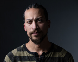 Fototapeta premium Black man portraits on grey background
