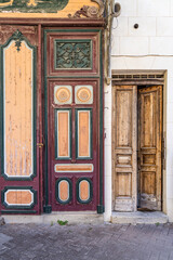 Colorfully painted old wooden door.