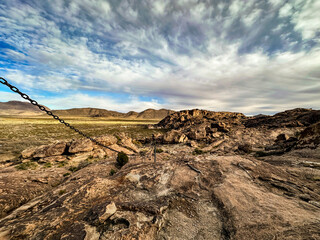 chain rope down mountain.