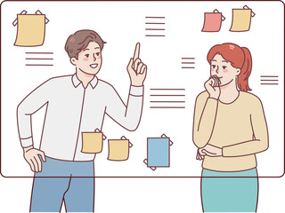 Businesspeople brainstorm near board