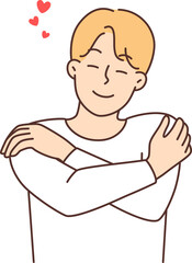 Smiling man hug himself show self-love