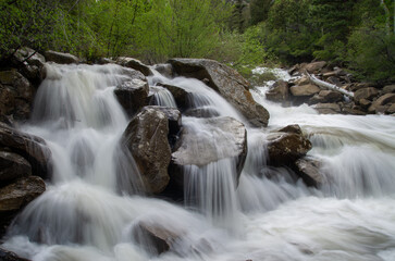 River water cascading over boulders