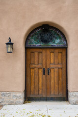Church door on adobe style building in the southwest