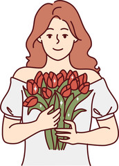 Portrait of woman with flowers in hands