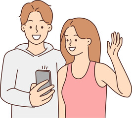Smiling couple talking on video call on cell
