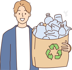 Smiling man hold plastic for recycling