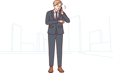 Businessman talk on cellphone check time on clock