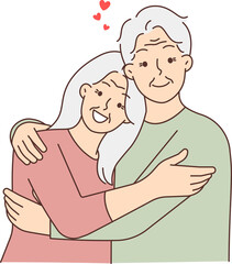 Happy elderly couple hugging