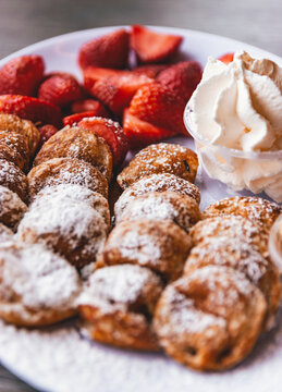 poffertjes with strawberries and creme