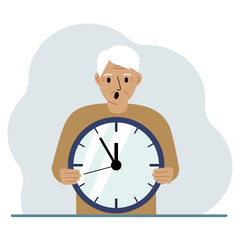 The man is holding a big clock in his hands. Time management, planning, organization of working time, effective business, deadline.