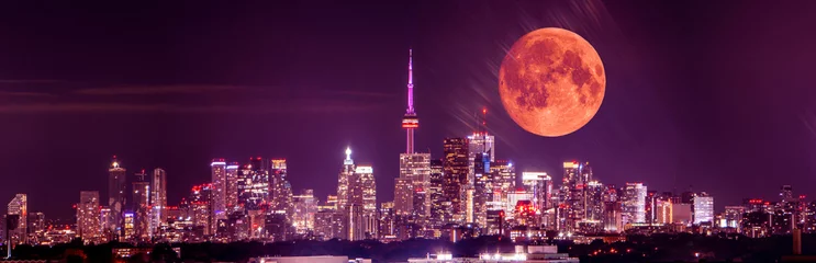 Fotobehang Full moon over Toronto at night. Toronto, Ontario, Canada skyline and moonlight of full moon. Cityscape with rising moon over GTA center. Great Toronto Area night city view. © desertsands