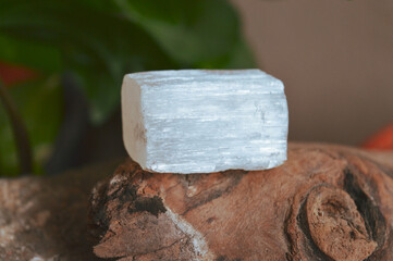 Sekenite mineral stone on wood