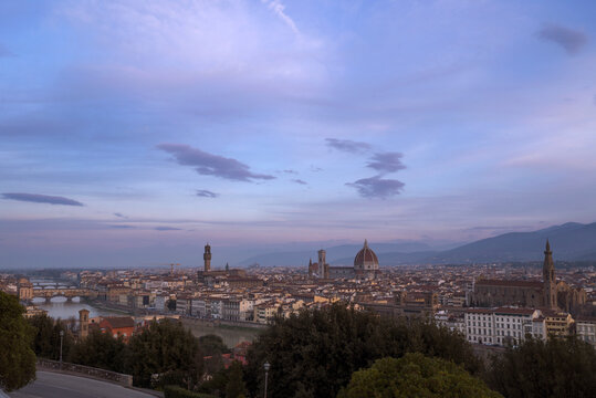 Distance view of Palazzo Vecchio and Duomo Santa Maria Del Fiore in city against sky