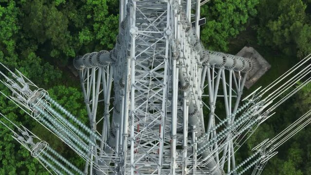 Aerial footage of  Electricity tower on mountain
