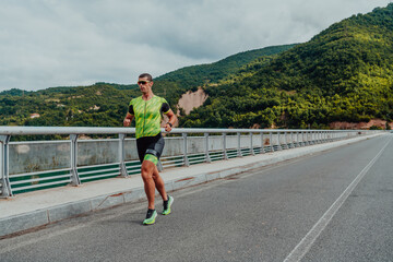 An athlete running a marathon and preparing for his competition. Photo of a marathon runner running...