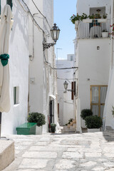Beautiful view of the narrow street of the city of Ostuni.
