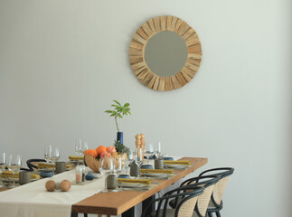 Dining table with decorated kitchen utensils