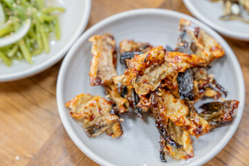 Spicy dried fish as a side dish in a Korean restaurant restaurant