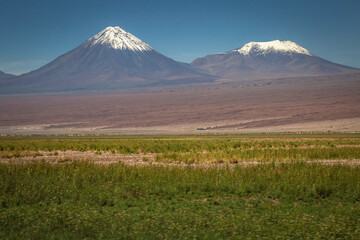 Fototapeta premium Licancabur and dramatic volcanic landscape at Sunset, Atacama Desert, Chile