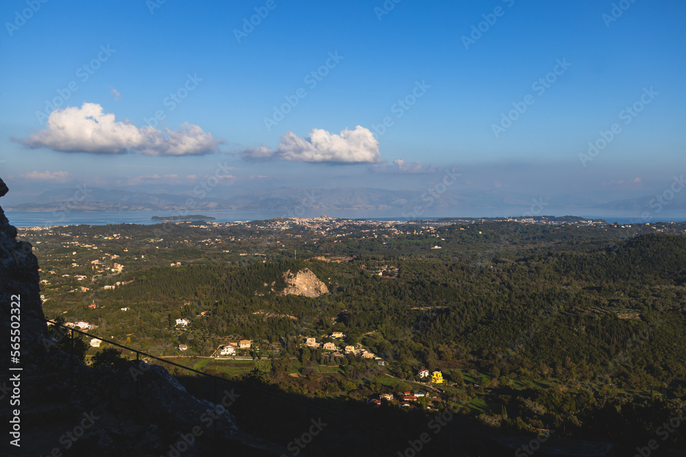 Wall mural Corfu island view from Kaiser's Throne observation deck lookout, Pelekas village, Greece, Kaiser William II summit Observatory panoramic summer view with mountains, sea and Kerkyra in a background