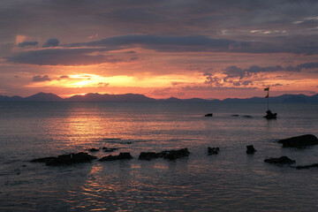 Sunset above Ko Yao island. View from Klong Muang Beach. Krabi Province, Thailand.