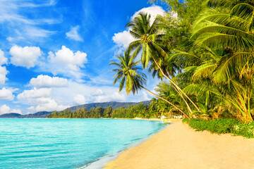 Beautiful tropical island sea beach landscape, turquoise ocean water, yellow sand, sun blue sky...
