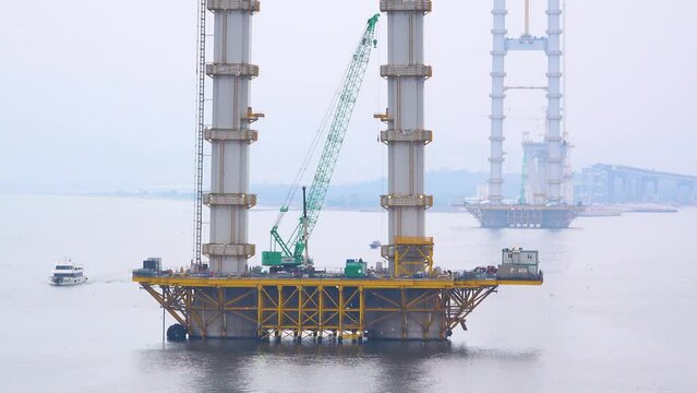 Istanbul Osman Gazi Bosphorus Bridge construction and time lapse view of marine cranes