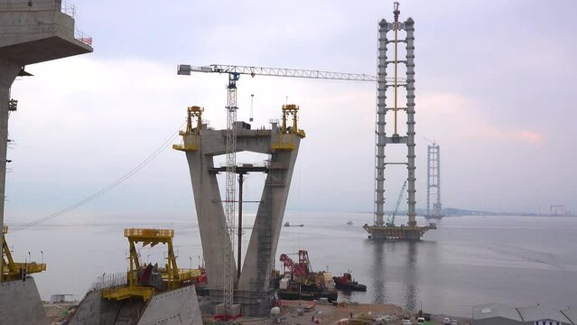 Istanbul Osman Gazi Bosphorus Bridge construction and view of sea cranes