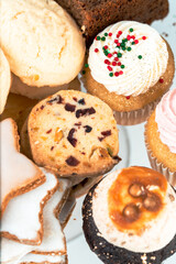 Collection of sweet treats on a white background. Baked goods presentation concept.