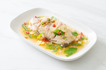 steamed sea bass fish with herbs