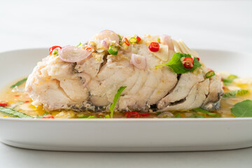 steamed sea bass fish with herbs