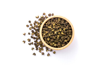 Sichuan Pepper green in wooden bowl isolated on white background, top view , flat lay.
